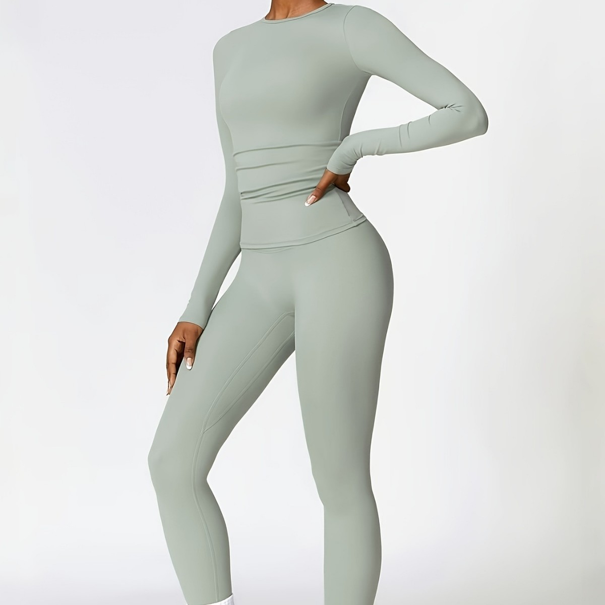 بدلة يوجا ضيقة ذات أكمام طويلة - مراجعة Pilates & Yoga Reversible Mockneck Sweatshirt وسعره